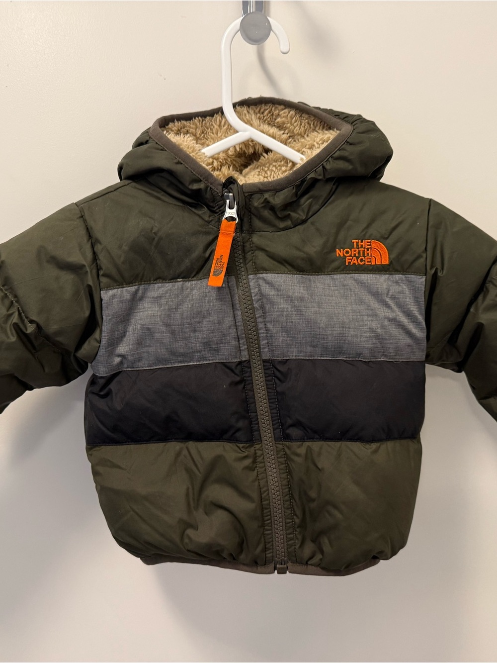 The North Face Kids Olive Puffer Jacket with Orange Logo 6-12 months